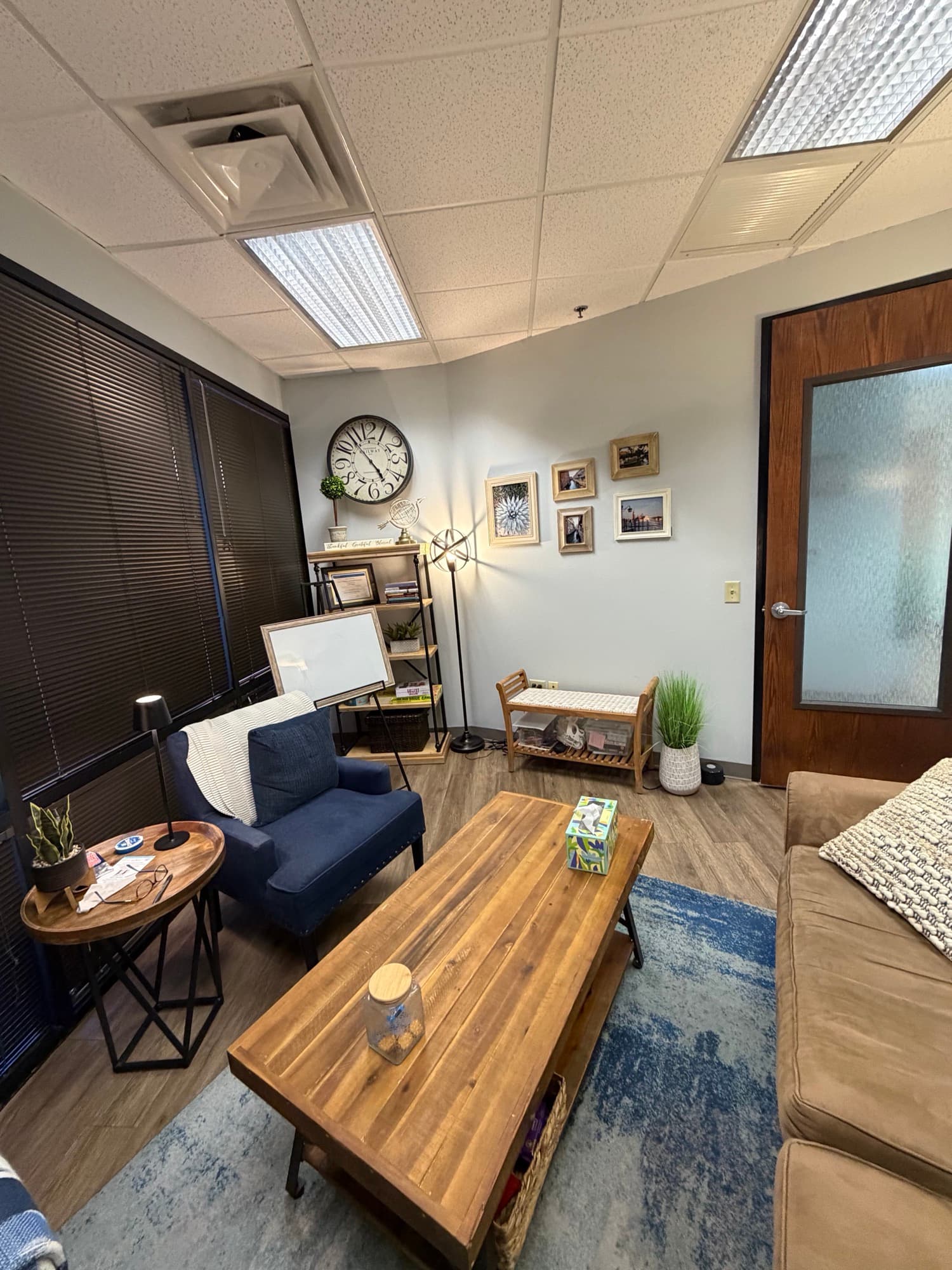 Sitting area with a gallery wall and reading nook